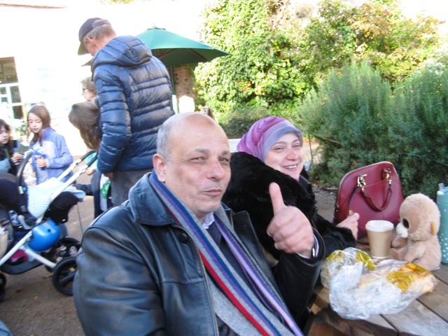 Refugee couple at lunch in the Botanics